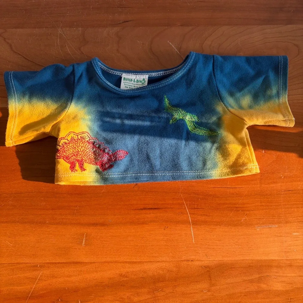 Build-A-Dino Build-A-Bear Tie Dye Dinosaur Embroidered Plush Shirt Blue Yellow